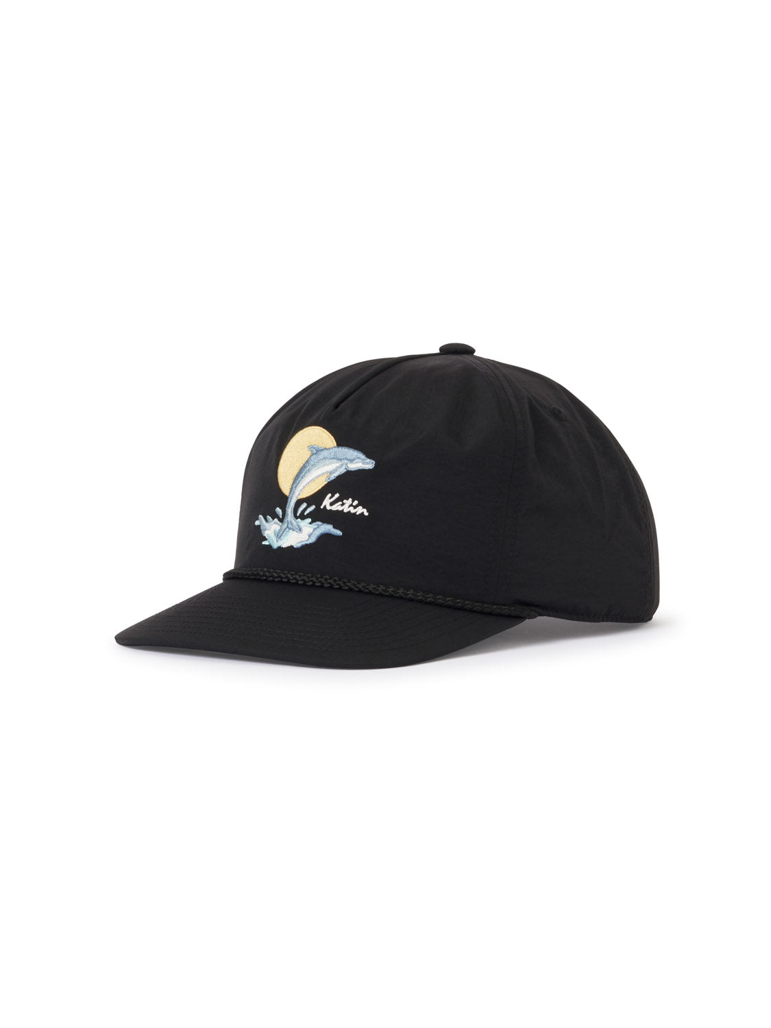 The Katin Splash Hat by Katin is a black cap made from recycled nylon, featuring an embroidered wave, yellow sun, white script on the front, dolphin embroidery, a curved brim, and decorative rope detail above the brim.