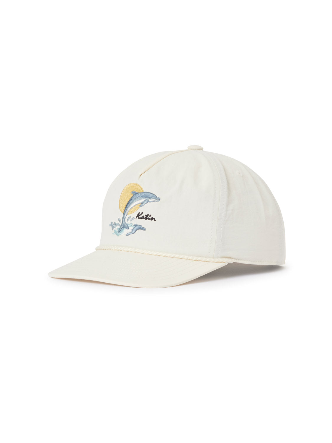 The Katin Splash Hat baseball cap features a wave, yellow sun, and Katin logo embroidered on the front. Made from recycled nylon by Katin, it’s shown angled against a white background.