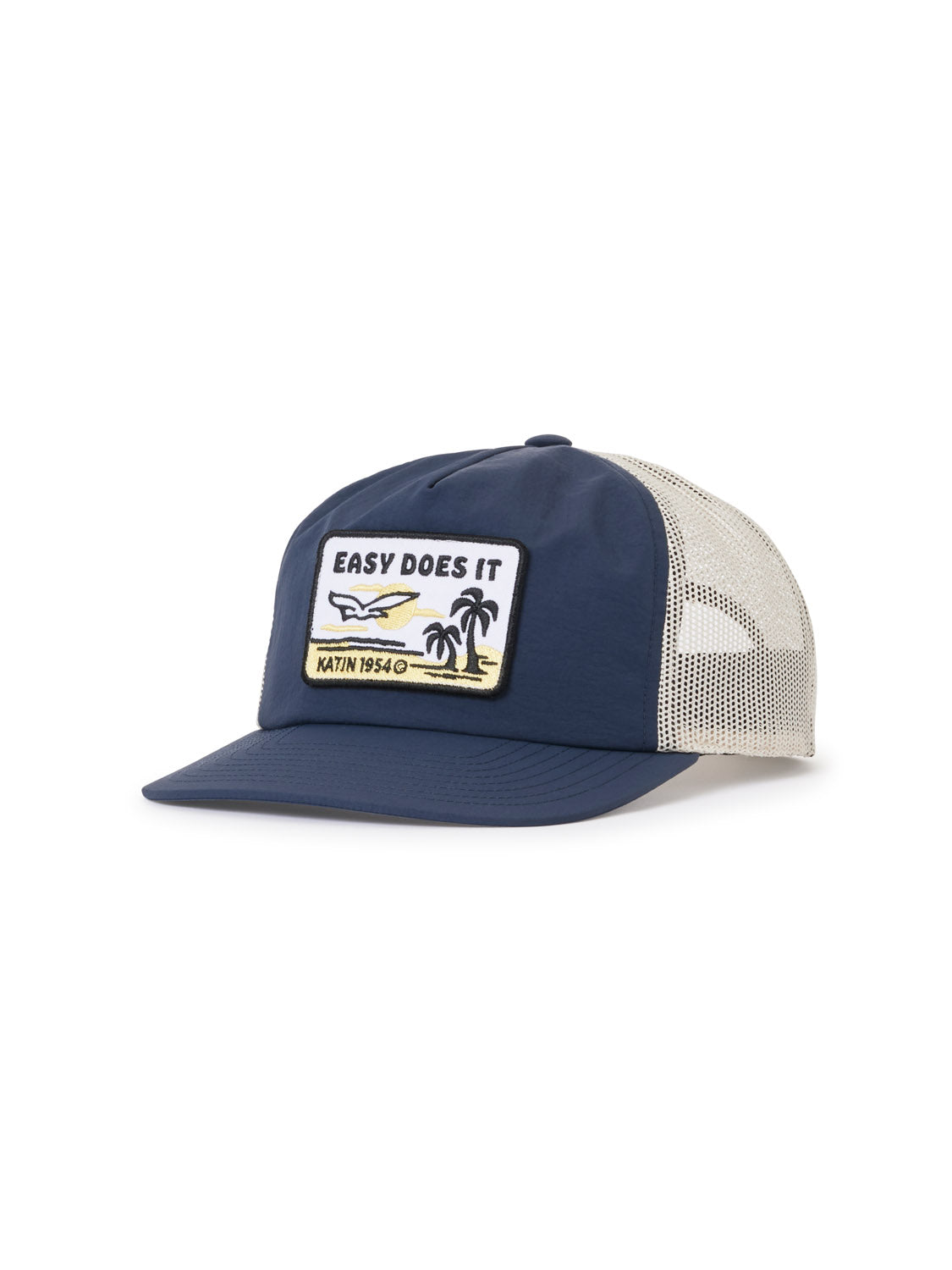 The Katin Squawk Trucker Hat by Katin features a blue and white design, custom patch with palm trees, sun, “EASY DOES IT” and “KATIN 1954,” curved brim, beach theme, and adjustable snapback closure.
