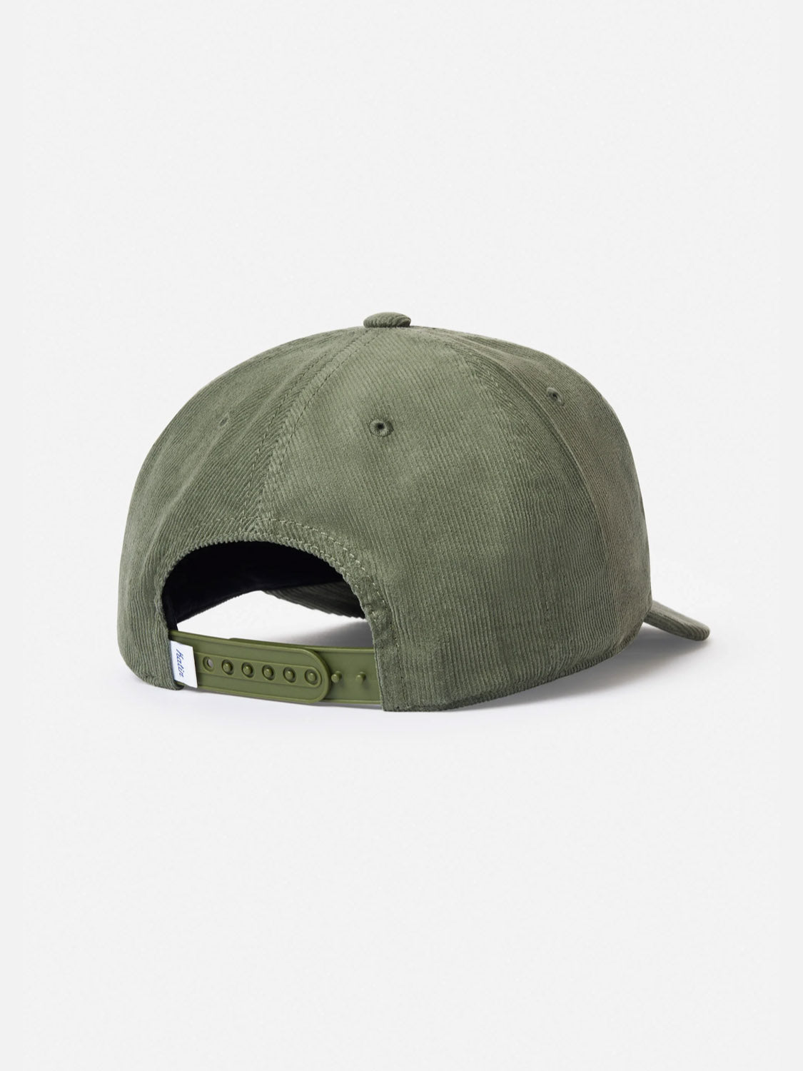 The Katin Stroll II Hat in olive green cotton corduroy is shown from the back, featuring an adjustable snapback closure and a small white tag on the strap.