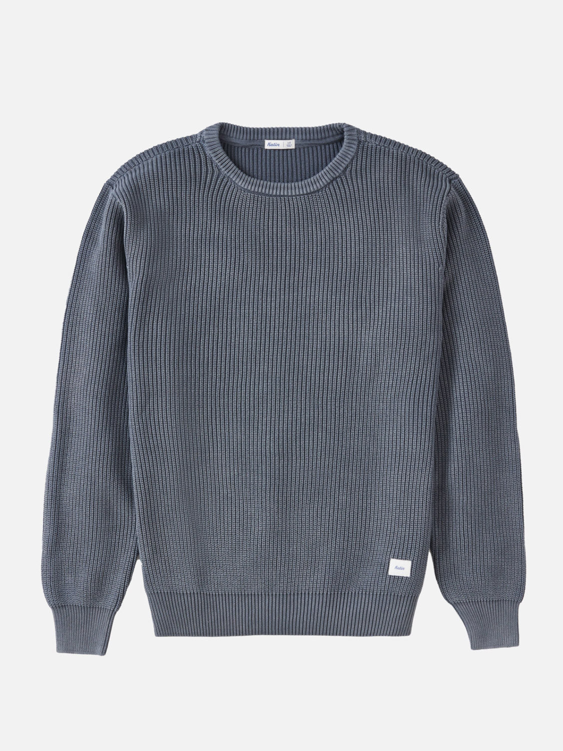 The Katin Swell Sweater is a long-sleeve, ribbed knit in grayish-blue with a crew neckline, vintage wash, and a small white rectangular tag near the hem, shown flat on a light background.