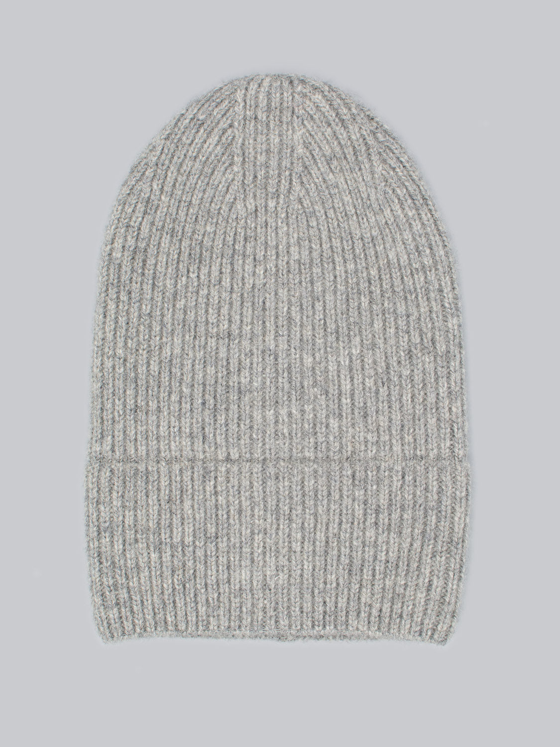 The Telluride Wool Beanie from ID Menswear, known for its natural insulation and comfortable fit, sits on a light gray background.