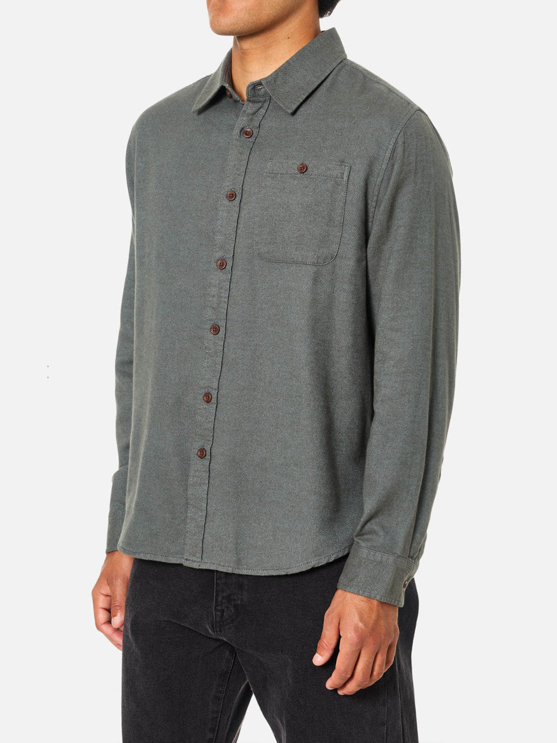 A man wearing the Katin Twiller Flannel Button Down Shirt.