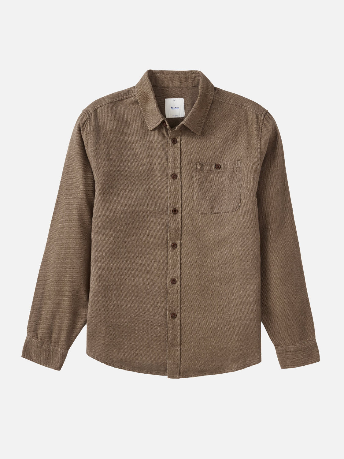 The Katin Twiller Flannel Button Down Shirt features soft brown cotton flannel, long sleeves, a collar, and a single chest pocket, shown on a plain white background.