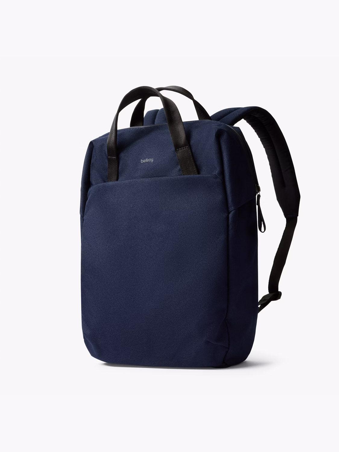 The Bellroy Via Workpack - 18L is a sleek, dark blue laptop backpack with black handles, a front zip pocket, and adjustable shoulder straps. Made from water-resistant fabric for commuters, it's shown against a plain white background.