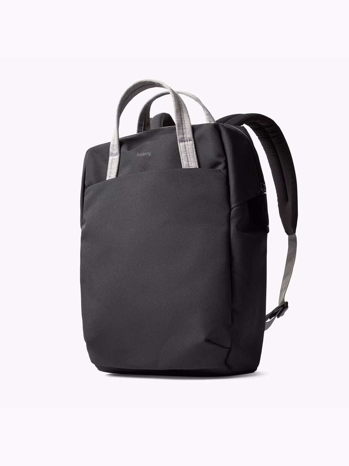 The Bellroy Via Workpack - 18L is a black, water-resistant backpack with light gray handles and shoulder straps. It stands upright on a white background and features a minimalist design with no visible logos or exterior pockets.