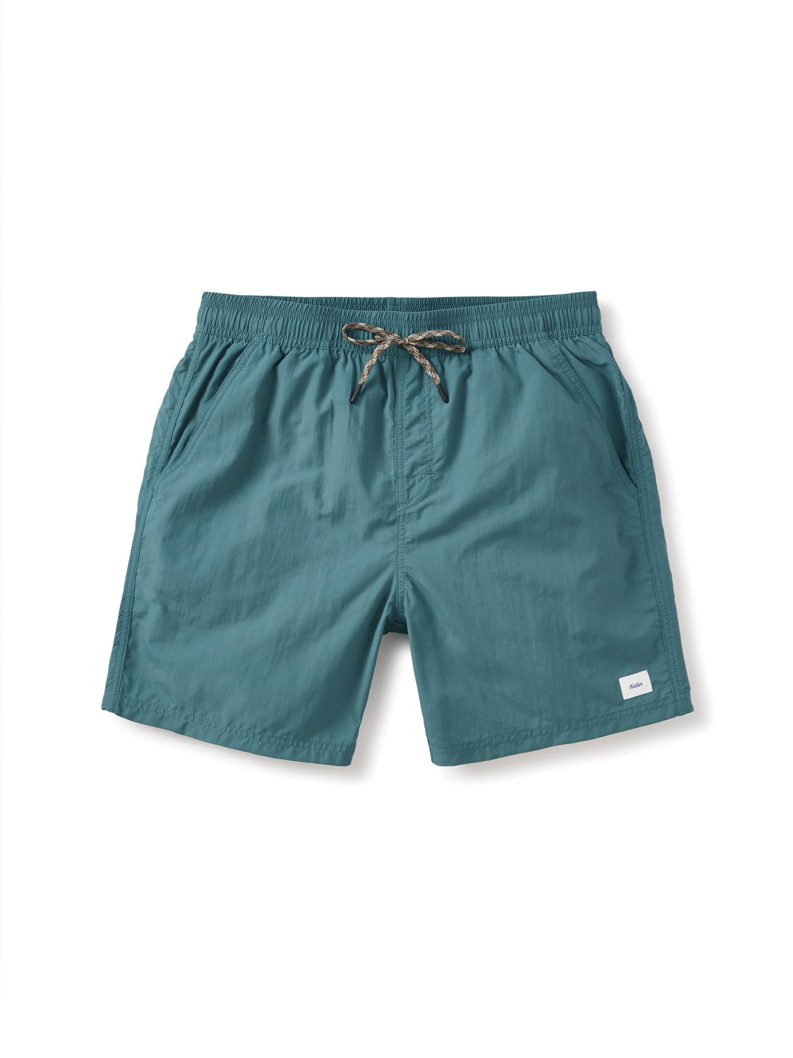 The Katin Poolside Volley shorts by Katin are teal nylon with an elastic waistband, drawstring, side pockets, and a small white label on the bottom left leg. They are shown laid flat on a white background.