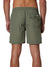 A person is seen from the back wearing Katin Poolside Volley swim trunks in olive green, featuring an elastic waistband, mesh brief lining, and a single buttoned pocket on the right side. The background is plain white.