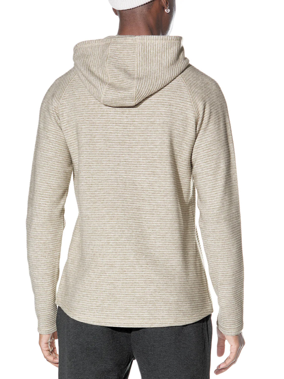 A person is shown from the back wearing the Civil Society Wolfe Waffle Knit Hoodie in light beige with thin horizontal stripes and a textured knit, paired with dark pants, against a white background.