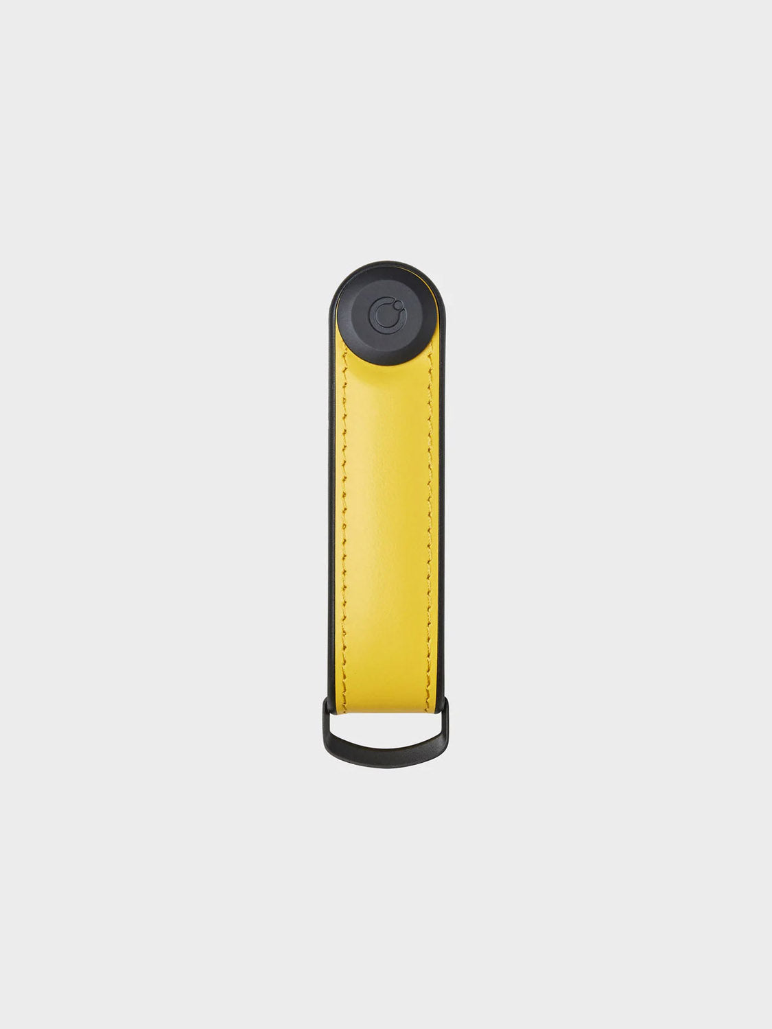 The Orbitkeys Key Organizer Hybrid Leather is a yellow Nappa leather key holder with black edges, a black button on top, and a black metal loop at the bottom, featuring a secure locking mechanism, shown on a plain white background.