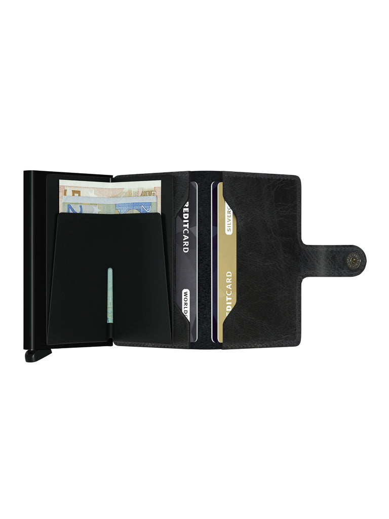 The Secrid Miniwallet Vintage Leather in black is open on a white background, showing slots with two credit cards, a compartment for Euro banknotes, and a snap button closure.