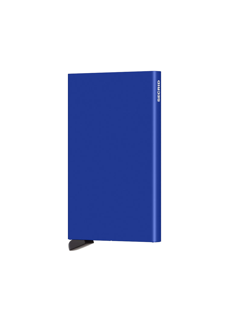 A blue rectangular Secrid Cardprotector Minimal Wallet stands upright with a black base, Secrid written in white on its side, isolated on a white background—designed with RFID safe technology for secure card protection.