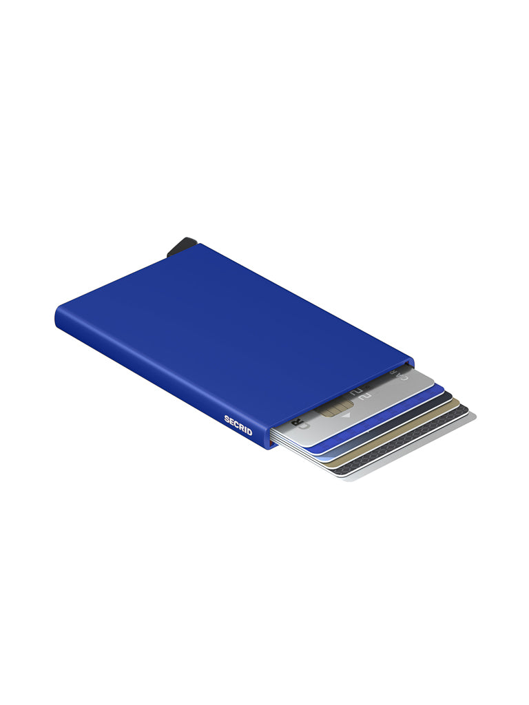 The Secrid Cardprotector Minimal Wallet is a slim, blue RFID-safe wallet with several cards partially ejected in a staggered arrangement, showing different card edges. The Secrid brand name is printed on the side.