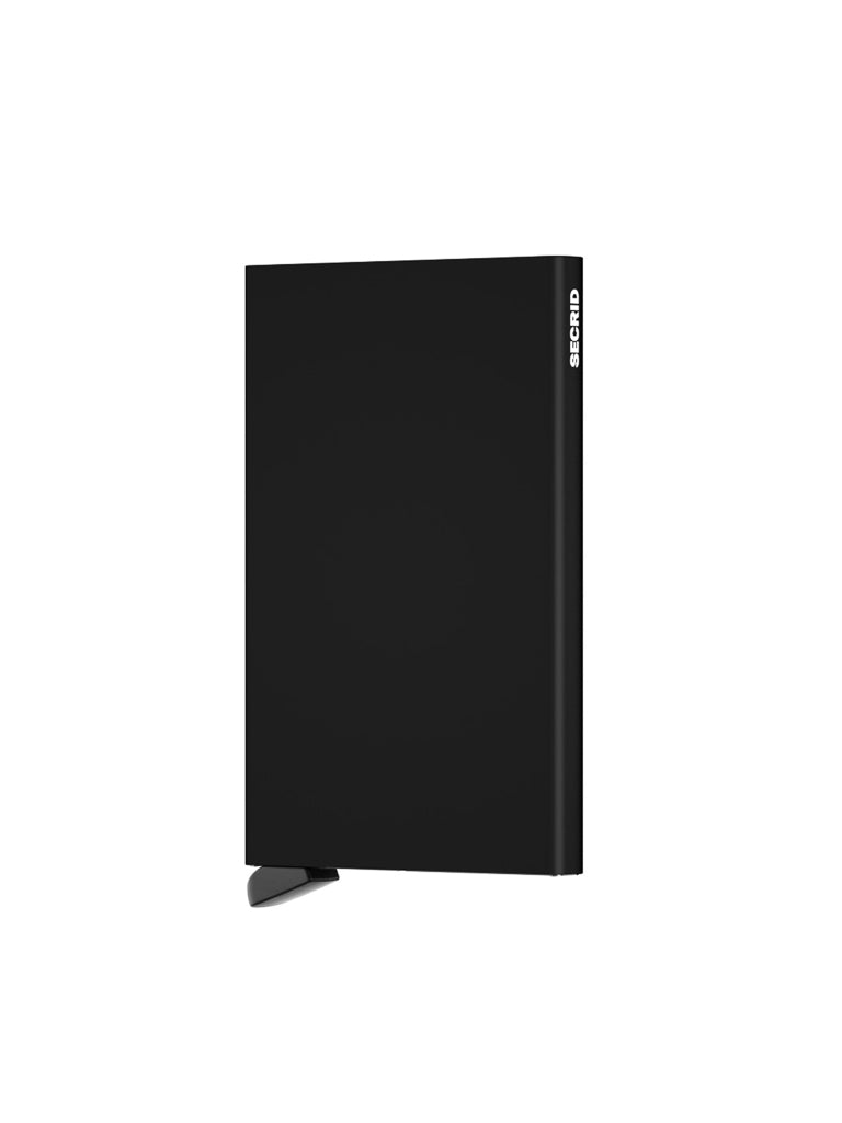 A slim, rectangular black Cardprotector Minimal Wallet by Secrid stands upright on a small base, with the brand name in white on the top right edge, evoking minimalist design. The background is plain white.