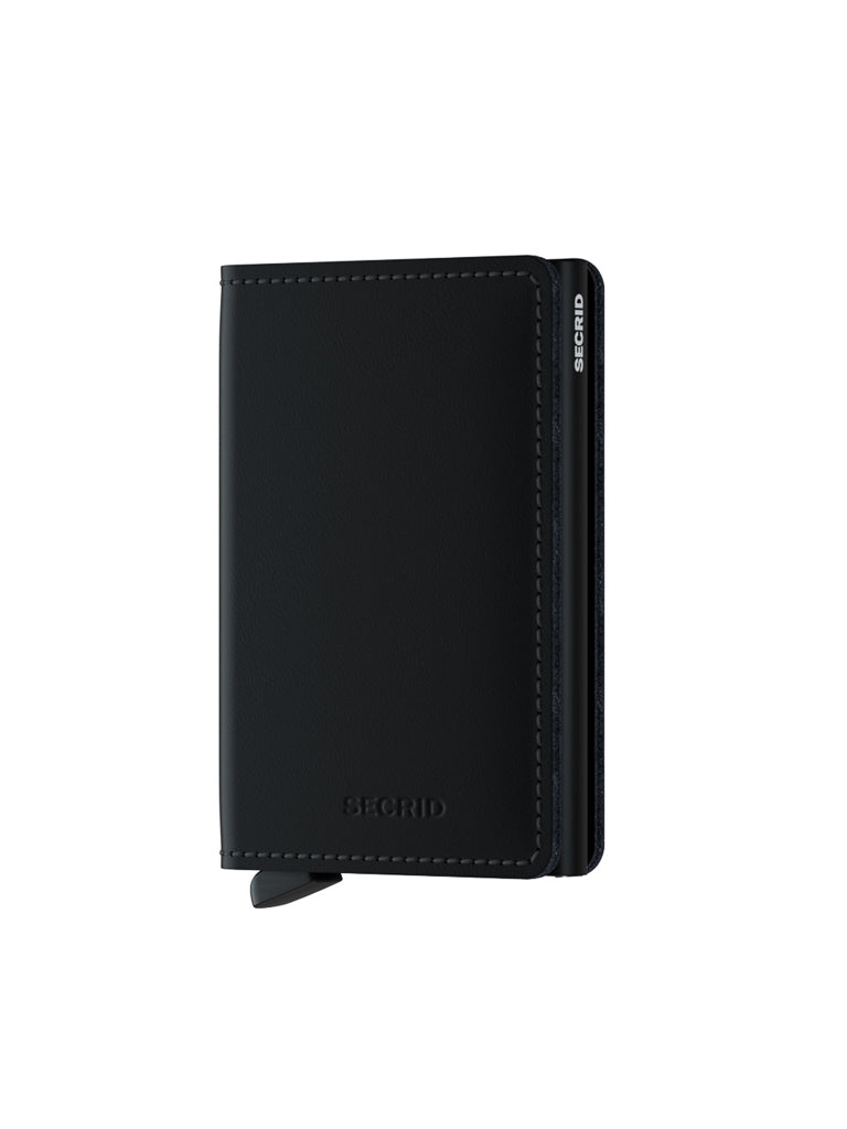 A Secrid Slimwallet Matte Finished Leather in black, featuring visible stitching and a slim, compact design, is shown standing upright against a plain white background.