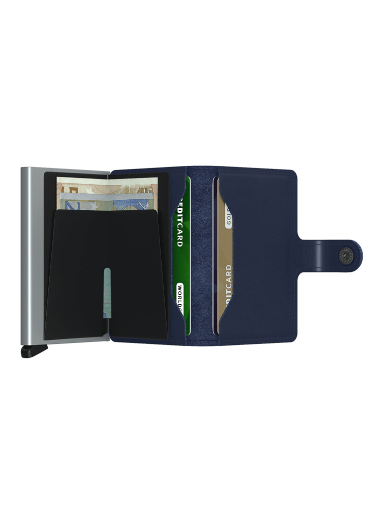 The Secrid Miniwallet Original by Secrid, shown open with card slots and compartments for euro banknotes, is displayed against a white background. This compact navy wallet features RFID security to protect your cards.