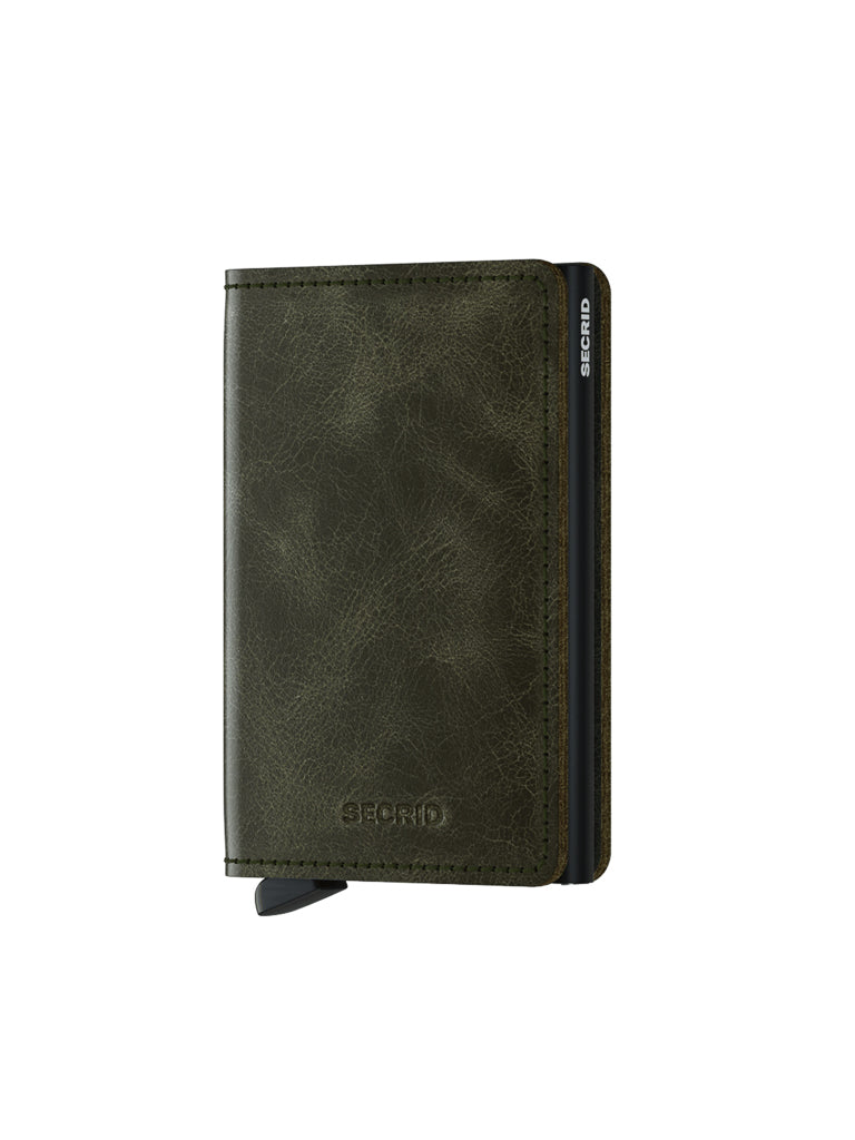 The Secrid Slimwallet Vintage Leather in dark olive green features subtle texture, visible stitching, RFID protection, a bottom tab, and an embossed Secrid logo on the front.