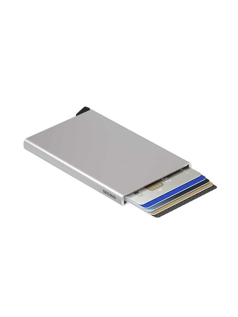 The Secrid Cardprotector Minimal Wallet, shown in slim silver, partially ejects four payment cards in a staggered layout against a white background, showcasing its RFID-safe and minimal design.
