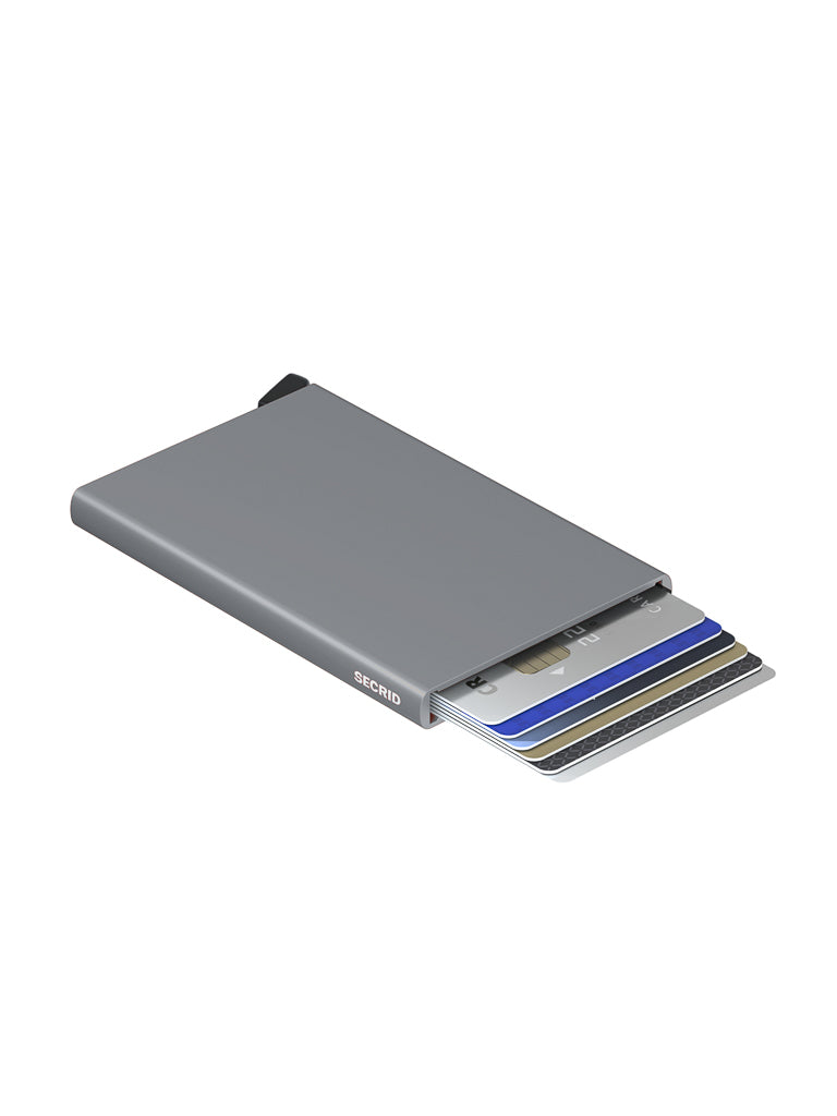 The Secrid Cardprotector Minimal Wallet is a slim, rectangular, silver-gray metallic wallet with RFID protection and a minimalist design that securely holds and partially ejects several credit cards in a staggered layout.
