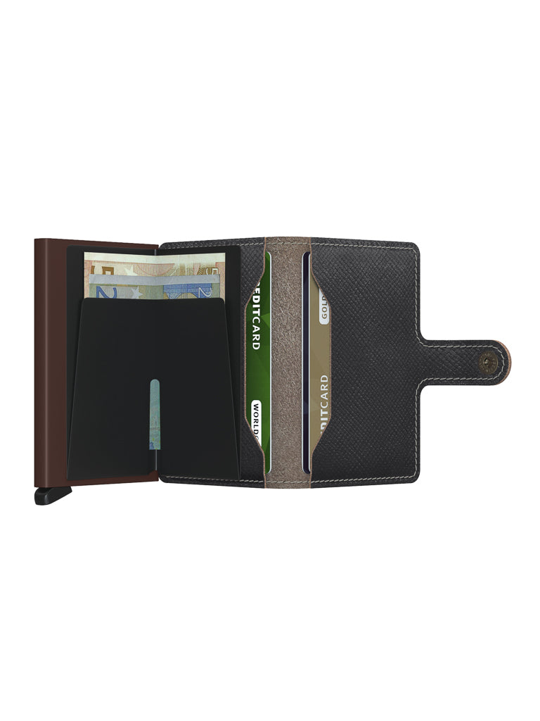 The Secrid Miniwallet Saffiano Leather in black displays euro banknotes and credit cards in its RFID-protected slots, with a right-side button clasp for added security.