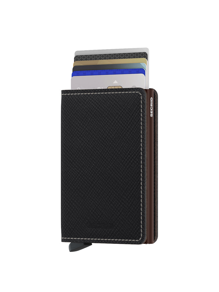 The Secrid Slimwallet Saffiano Leather is a black textured wallet with white stitching and a small black “SECRID” tab. Partially open, it shows several cards inside, and offers built-in RFID protection.