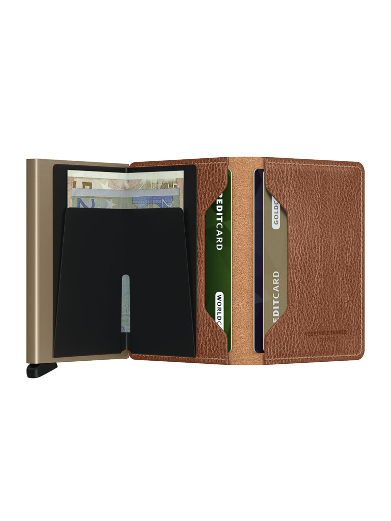 The Secrid Slimwallet Vegetable Tanned Leather, shown open on a white background, displays several credit cards, a folded euro note, and a metallic card holder inside.