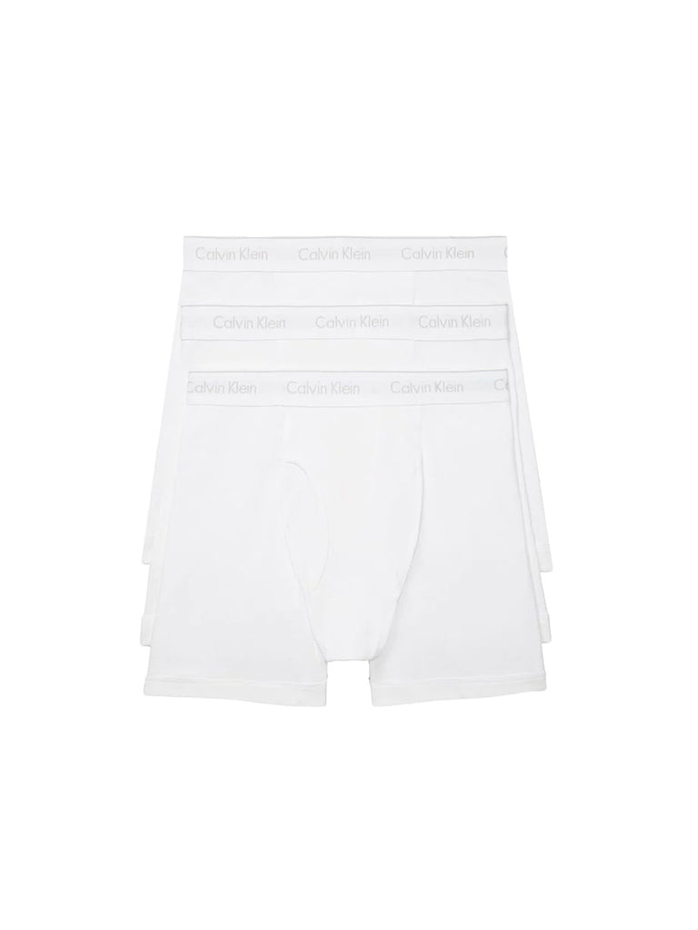Three pairs of Calvin Klein NB4003 Cotton Classic Boxer Briefs are stacked, showcasing the branded waistbands. Made from pure cotton, these men’s underwear offer comfort and style against a plain white background.