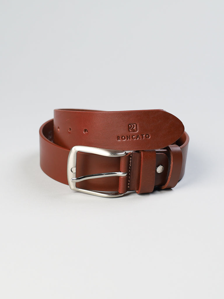 The 4550 Made in Italy Leather Belt by ID Menswear is a coiled brown leather belt featuring a silver rectangular buckle and an embossed logo. This Italian-made accessory stands out against a plain light gray background.