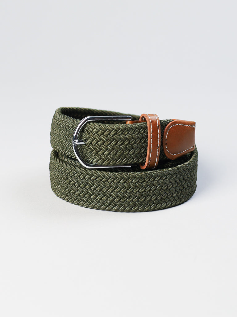 The ID Braided Stretch Woven Belt by ID Menswear features a green coiled design, metal buckle, and brown leather accents set against a plain white background.