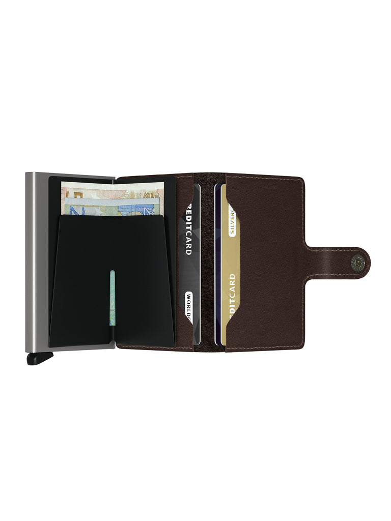The Secrid Miniwallet Original by Secrid is an open brown leather compact wallet with compartments for euro banknotes and cards, features RFID security, and is displayed against a white background.