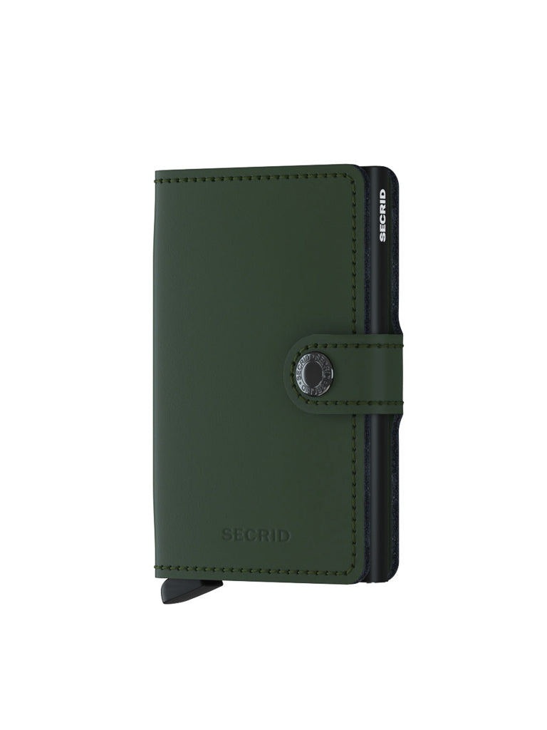 The Secrid Miniwallet Matte Finish Leather is a compact, dark green RFID security wallet with a buttoned strap and SECRID embossing, combining sleek, minimalist design and modern essentials protection.