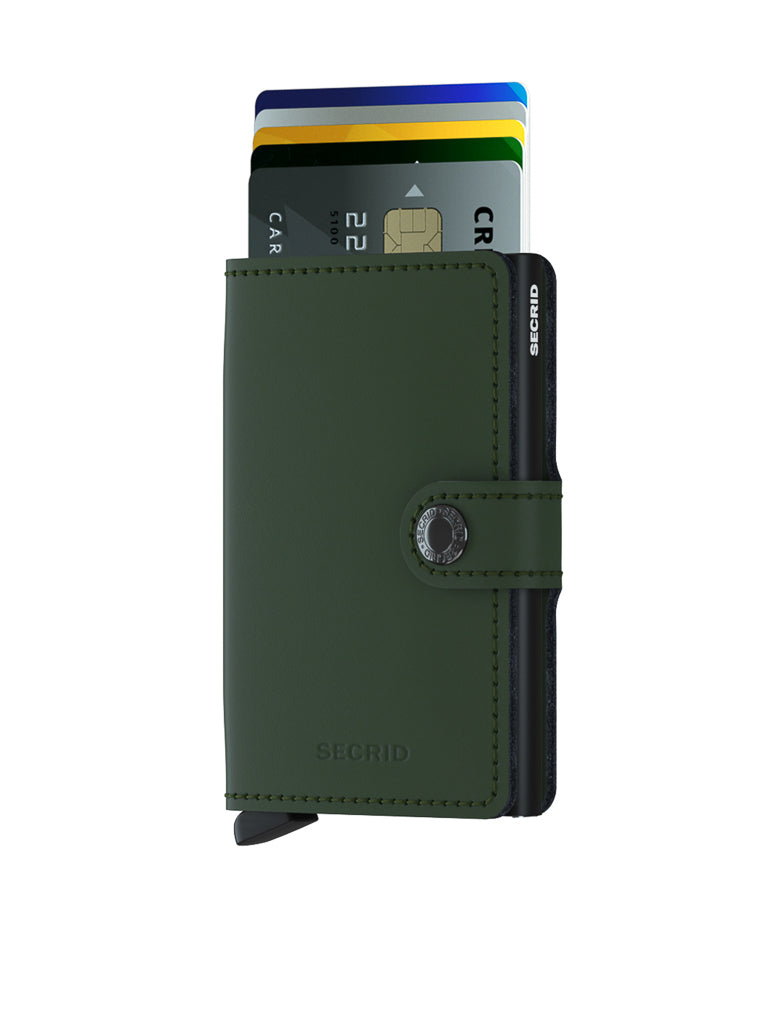 A Secrid Miniwallet Matte Finish Leather in green, featuring a snap closure and RFID security, is shown on a white background with several credit cards partially extended from the top.