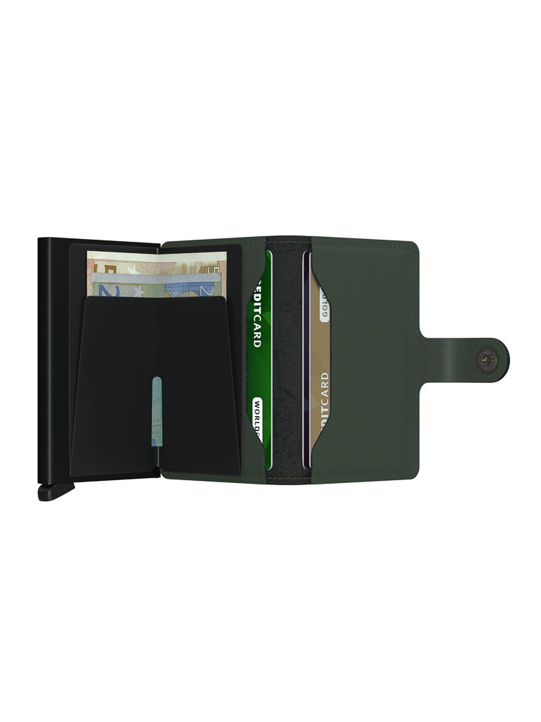 The Secrid Miniwallet Matte Finish Leather is an open, compact dark green wallet with a snap closure, neatly holding Euro banknotes and several credit cards in organized slots, displayed on a white background.