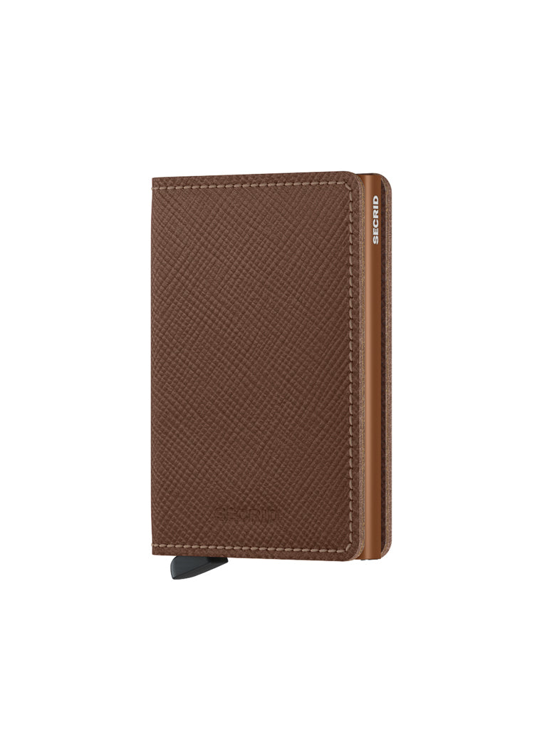 The Secrid Slimwallet Saffiano Leather is a closed, brown textured leather wallet with a metallic edge, a visible black card slot lever at the bottom, SECRID branding on the side, and built-in RFID protection.