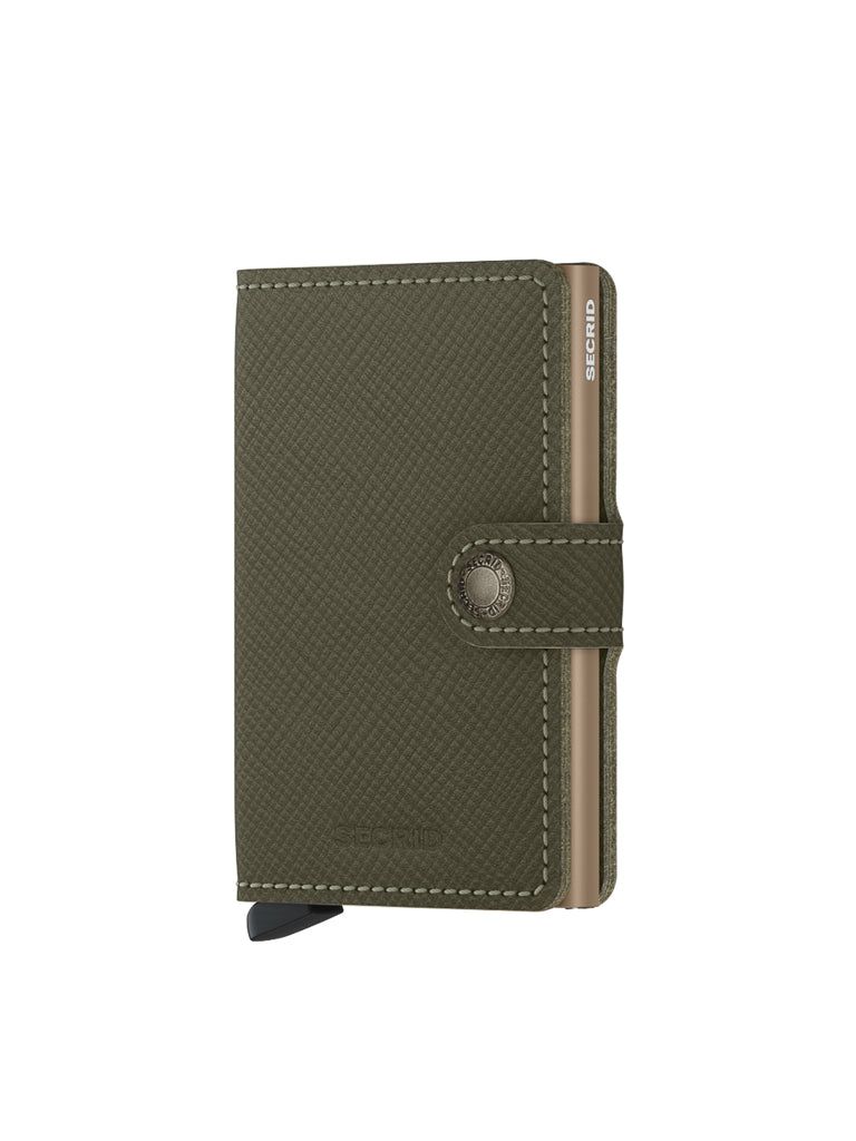 The Secrid Miniwallet Saffiano Leather in olive green features a snap closure, visible card edges, RFID protection, and a black tab at the bottom, shown against a plain white background.