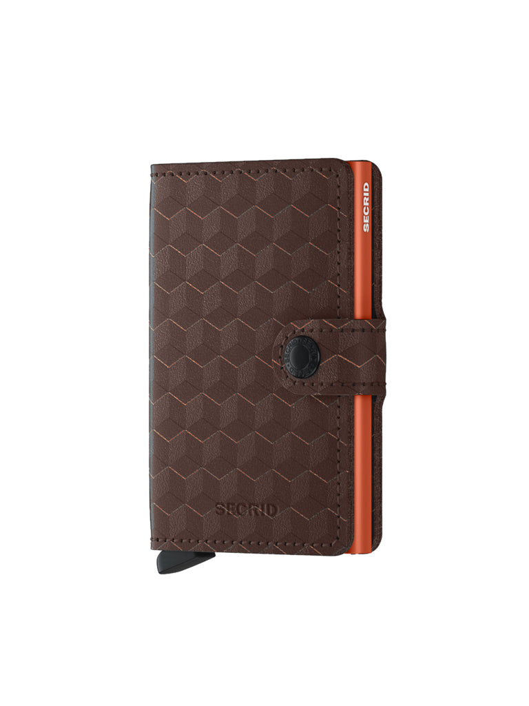 The Secrid Miniwallet Optical is a compact brown leather wallet with a geometric pattern, RFID protection, snap button closure, and orange side accents, shown standing upright on a white background.