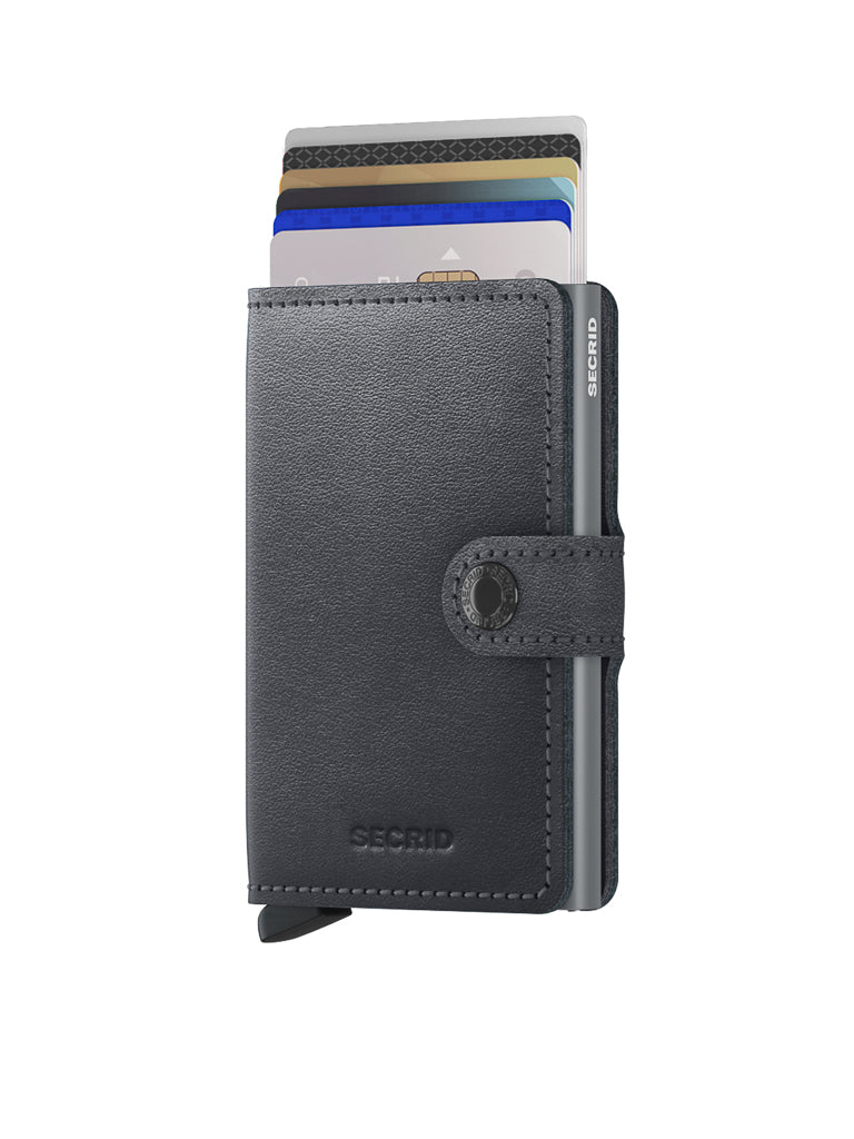 A Secrid Miniwallet Original in black, shown open with stacked credit cards, features a snap closure, minimalist design, and RFID protection—all set against a white background.