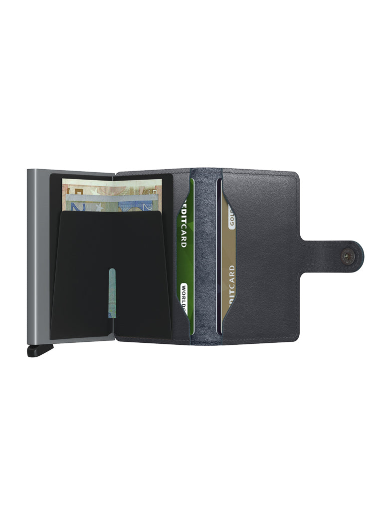 The Secrid Miniwallet Original by Secrid is shown open against a white background, displaying cash, two visible credit cards, extra card slots, and a snap button. This compact wallet offers RFID protection for your information.