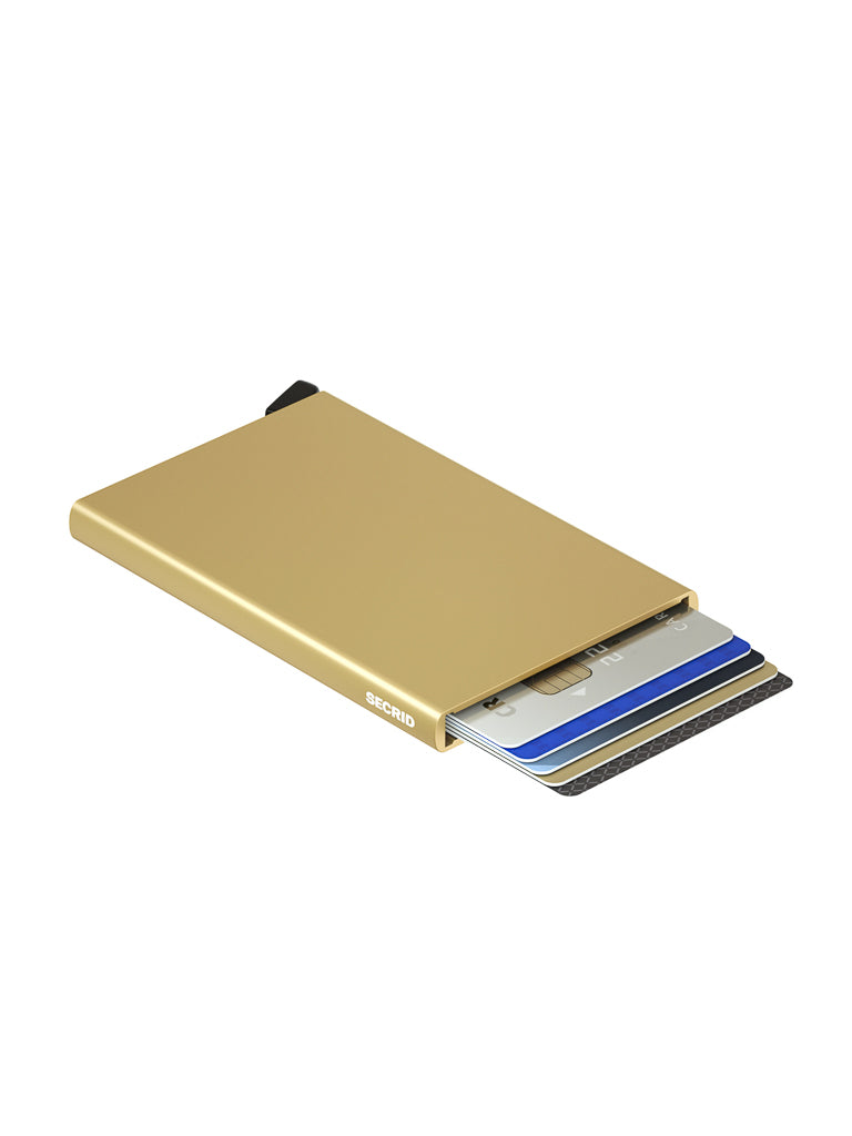 The Secrid Cardprotector Minimal Wallet is a slim, gold-colored RFID-safe wallet featuring the Secrid logo on the side, shown partially extended with four stacked cards, isolated on a white background.