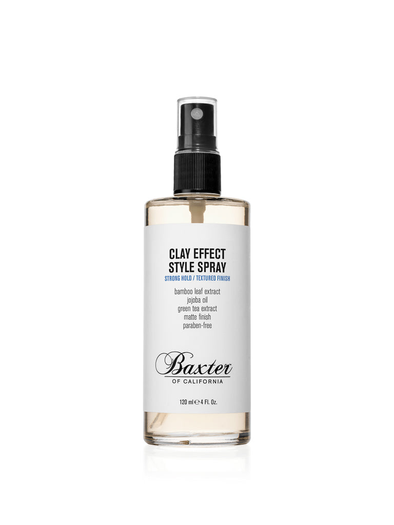 Baxter’s Clay Effect Style Spray is a 120 ml (4 fl. oz) texturizing hair spray with a strong hold and matte finish. It comes in a clear spray bottle with a black pump and a white label featuring blue and black text.