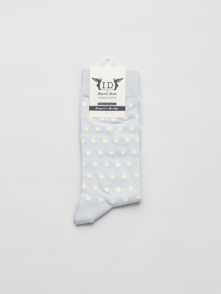 ID Menswears Polka Dot Graphic Socks feature premium combed cotton in light grey with white polka dots, displayed on a plain white background. The comfortable design includes neatly folded fabric and a small tag at the top.