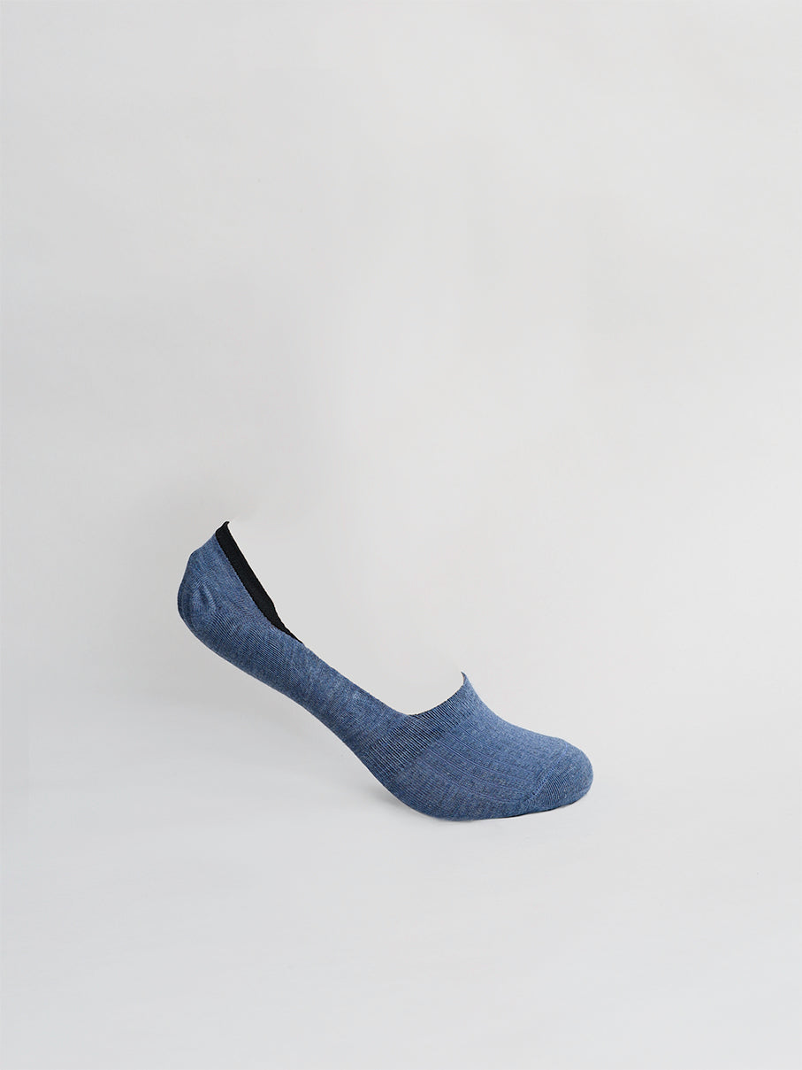 A blue no-show sock from ID Menswear, named No Show Low Lightweight Socks, is displayed on a white background. Made of breathable combed cotton, it features an elevated heel and a minimalist design to stay hidden when worn with shoes.