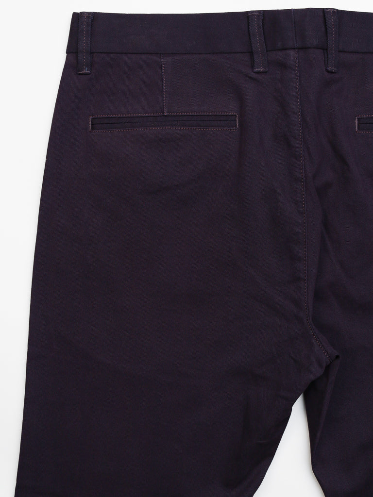 ID Menswears Banker Twill Stretch Chino in dark purple, displayed on a white background, features buttoned pockets and belt loops. These mid-rise, regular slim-fit chinos offer a stylish and sophisticated look for any occasion.