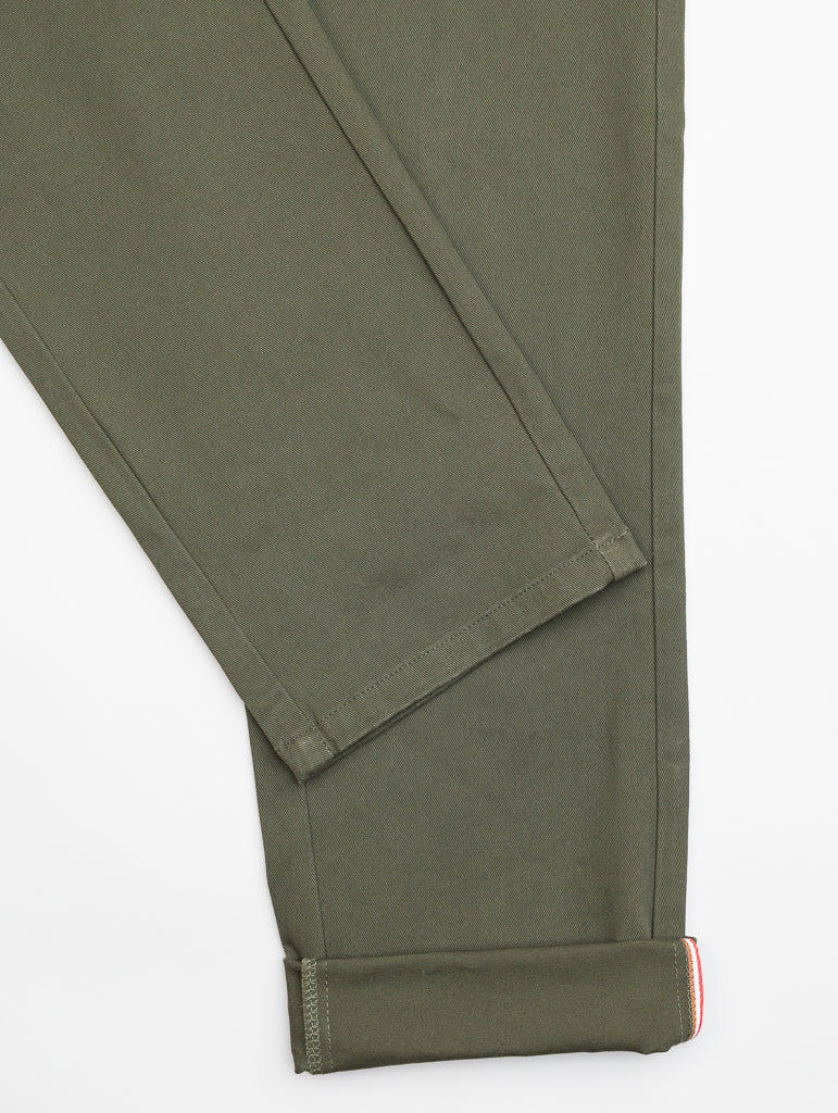 Olive green, mid-rise ID Menswear Banker Twill Stretch Chino with a visible rolled cuff reveals red and white stripes inside. Regular slim-fit design in smooth fabric elegantly displayed on a flat surface.