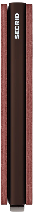 A brown Secrid Slimwallet Nile with a black cylindrical center, flanked by two reddish-brown textured panels, pictured from above—crafted for style and RFID protection.